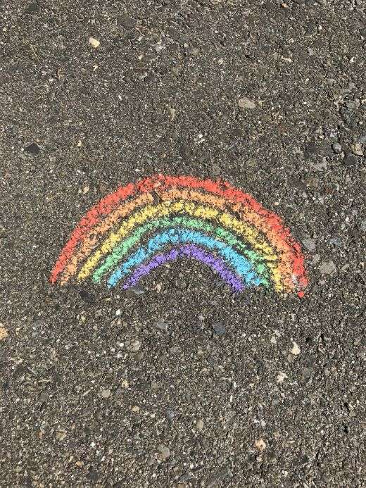 Colorful chalk on pavement representing the complexity and emotional layers of depression.