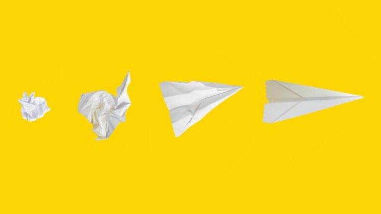 our stages of transformation shown through paper: from a crumpled ball to a smooth paper airplane, symbolizing progress and growth in Solution-Focused Therapy.
