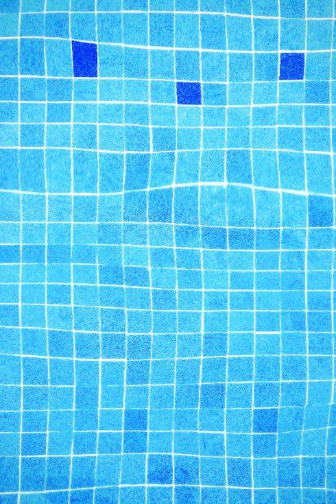 Abstract blue mosaic pattern representing how thoughts can become fragmented or distorted