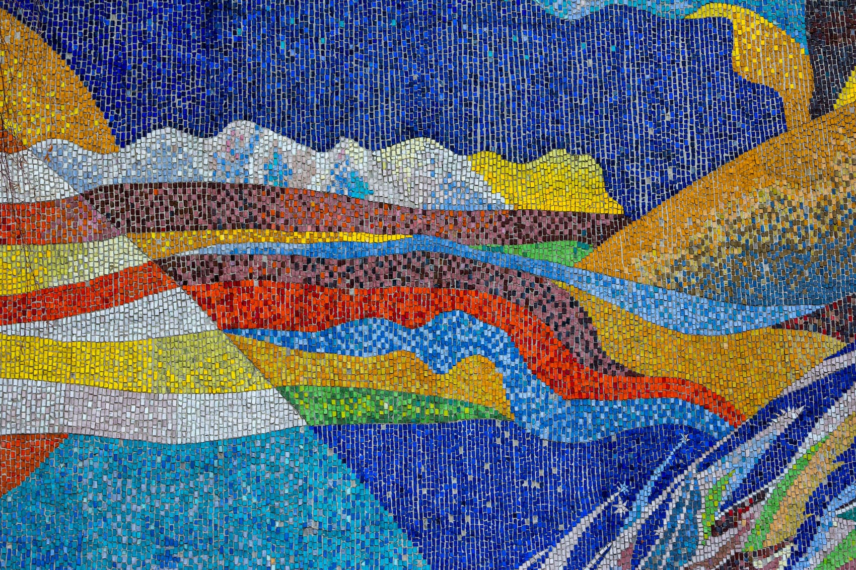 Colorful mosaic made of many individual pieces, symbolizing the complexity of identity and the idea that no single label can fully define a person.